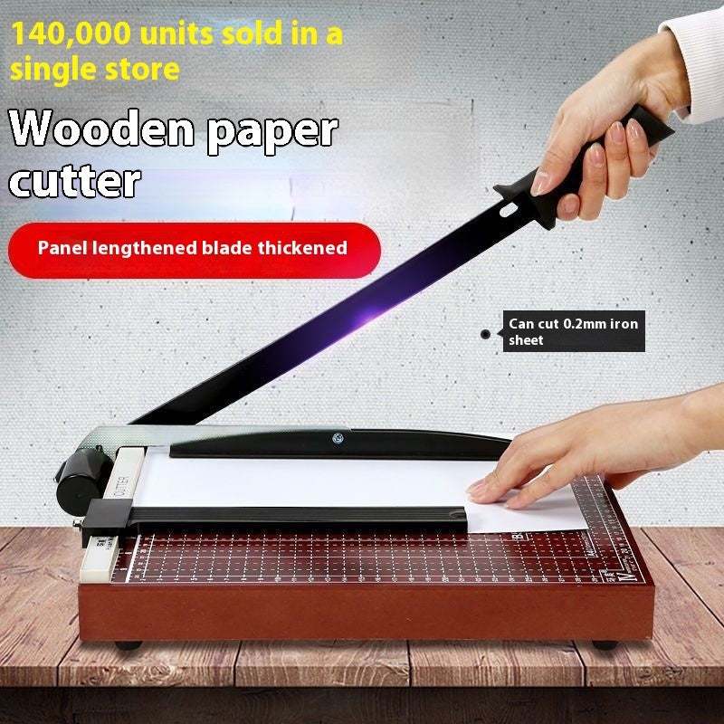 Paper Cutter in use by Protoolsy, trimming photos with accuracy