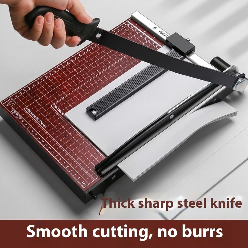 Paper Cutter in use, slicing B4 paper cleanly for crafting tasks